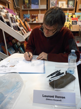 Laurent Verron, dessinant Bill